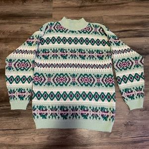 Gina Peters blue, green and purple sweater.